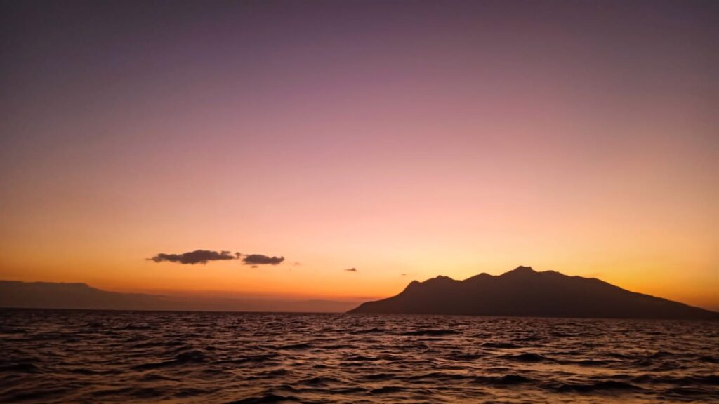 sunset and pulau Besar after the last dive